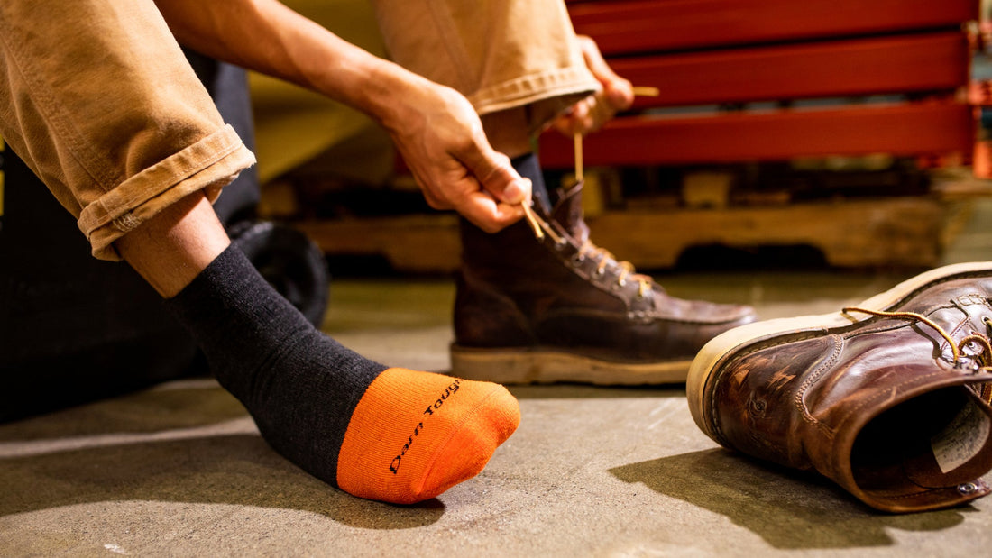 Image of model wearing the men's william jarvis boot work sock