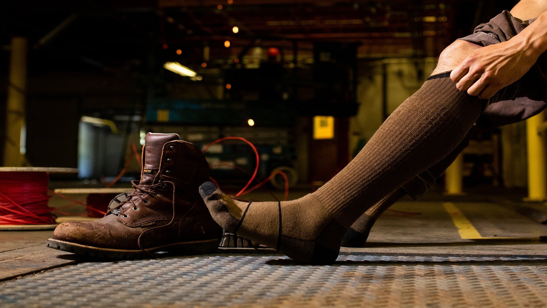 Men's Over the Calf Paul Bunyan Work Sock with work boots.