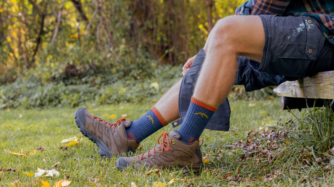Image of model wearing the men's light hiker micro crew hiking sock